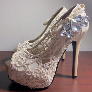 Nude Tan Lace Pumps